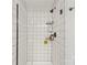 Modern shower with sleek subway tile, glass door and dark hardware at 5549 Lemley Nw Rd, Concord, NC 28027