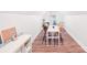 Cozy attic space featuring a table with chairs, white walls, and natural light from the window at 6006 Waxhaw Crossing Dr, Waxhaw, NC 28173