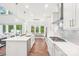 Bright and airy kitchen with quartz countertops, stainless steel appliances, and an open layout at 6006 Waxhaw Crossing Dr, Waxhaw, NC 28173