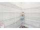 Walk-in pantry with ample shelving for organized storage at 6006 Waxhaw Crossing Dr, Waxhaw, NC 28173