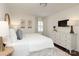 Tranquil main bedroom with neutral decor, natural light, and modern furniture at 6036 Sharon Acres Rd, Charlotte, NC 28210
