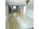 Spacious kitchen with vintage cabinets, tile floors and plenty of room for customization at 6115 Amberly Ln, Charlotte, NC 28213
