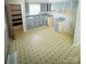 Spacious kitchen featuring ample cabinet space and a double sink at 6115 Amberly Ln, Charlotte, NC 28213
