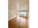 Living room featuring hardwood floors and a bright, open space at 6115 Amberly Ln, Charlotte, NC 28213