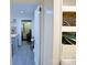 Hallway showing view from the kitchen into the living room and other interior elements at 6124 Old Plank Rd, Charlotte, NC 28216