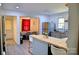 Open kitchen with butcher block countertops and view to the dining room at 6124 Old Plank Rd, Charlotte, NC 28216