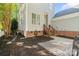 Backyard with small patio, wooden stairs, garden beds with mulch, and a light gray home exterior at 6165 Caseys Side Way, Fort Mill, SC 29708
