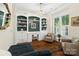 Charming home office with custom built-in shelving and large window at 6165 Caseys Side Way, Fort Mill, SC 29708