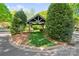 Neighborhood pavilion features a covered roof, beautiful green space, benches, and mature landscaping at 6165 Caseys Side Way, Fort Mill, SC 29708