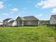 Well-kept backyard featuring a screened porch and fenced perimeter for privacy at 621 Summey Farm Dr, Dallas, NC 28034