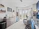 Welcoming Bedroom featuring a cozy rocking chair, crib, dresser, and bright windows at 621 Summey Farm Dr, Dallas, NC 28034