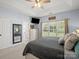 Bright bedroom offers neutral paint, an abundance of light, and large closet space at 621 Summey Farm Dr, Dallas, NC 28034