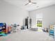 Spacious bonus room featuring a ceiling fan and lots of natural light at 621 Summey Farm Dr, Dallas, NC 28034