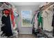 Walk-in closet featuring rods for hanging clothes, shelving, and a window at 6563 Kinder Ln, Lancaster, SC 29720