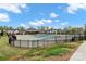 Large community pool surrounded by lush greenery and well-maintained fencing, offering a relaxing amenity at 6563 Kinder Ln, Lancaster, SC 29720