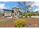 Elegant stone entrance sign for The Club at Walnut Creek, enhancing the community's welcoming appeal at 6563 Kinder Ln, Lancaster, SC 29720