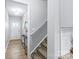 Bright entryway features wood flooring, a staircase, and access to other areas of the home at 6563 Kinder Ln, Lancaster, SC 29720