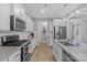 Modern kitchen boasts stainless steel appliances, granite countertops, and ample cabinet space at 6563 Kinder Ln, Lancaster, SC 29720