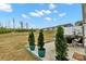 Stylish patio area featuring lush greenery and cozy seating, creating a serene outdoor living space at 6563 Kinder Ln, Lancaster, SC 29720