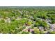 This beautiful aerial view features a lush, green neighborhood on a sunny day at 702 Hazel Ave, Kannapolis, NC 28083
