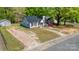 Charming single story home with blue exterior, walkway, and ample parking at 702 Hazel Ave, Kannapolis, NC 28083