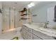 Elegant bathroom with a glass-enclosed shower, double vanity, and tasteful decor at 7048 Delta Lake Dr, Charlotte, NC 28215