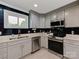 Modern kitchen featuring stainless steel appliances and granite countertops at 7048 Delta Lake Dr, Charlotte, NC 28215