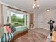 Inviting living room with a large window offering a view, comfortable seating, and stylish decor at 7048 Delta Lake Dr, Charlotte, NC 28215