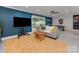 Spacious living room with sliding doors to the outside patio at 7048 Delta Lake Dr, Charlotte, NC 28215