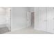 Bright bedroom with plush carpeting and connected bathroom at 710 Falling Oak Aly # 17, Huntersville, NC 28078