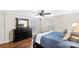 Comfortable bedroom featuring hardwood floors, a ceiling fan, and a large dresser at 775 Bolick Rd, Fort Mill, SC 29707