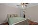 Cozy bedroom featuring wood floors and neutral colored walls looking into dining area at 775 Bolick Rd, Fort Mill, SC 29707