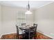 Cozy dining area featuring a round table, stylish chandelier, and inviting ambiance for meals at 775 Bolick Rd, Fort Mill, SC 29707