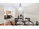 Open-concept dining area offering a view of the kitchen and living room, ideal for entertaining at 775 Bolick Rd, Fort Mill, SC 29707