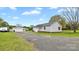Spacious backyard featuring a detached garage, camper, and a well-maintained lawn at 775 Bolick Rd, Fort Mill, SC 29707