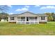 Inviting ranch-style home with a classic covered porch, creating a warm and welcoming entrance at 775 Bolick Rd, Fort Mill, SC 29707