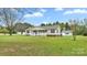 Ranch home with covered front porch, mature trees, and a large front yard offering curb appeal and outdoor space at 775 Bolick Rd, Fort Mill, SC 29707
