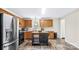 Traditional kitchen featuring stainless steel appliances, central island, and lots of cabinet storage space at 775 Bolick Rd, Fort Mill, SC 29707