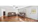 Cozy living room featuring hardwood floors, ample seating, and abundant natural light at 775 Bolick Rd, Fort Mill, SC 29707