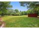 Expansive backyard featuring a huge lawn and lots of trees at 819 Old Dutch W Rd, Indian Trail, NC 28079