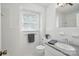 Bright bathroom with decorative mirror, granite countertop, and fixtures for an appealing aesthetic at 819 Old Dutch W Rd, Indian Trail, NC 28079