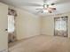 Bright bedroom features neutral walls, a ceiling fan, and matching curtains at 819 Old Dutch W Rd, Indian Trail, NC 28079