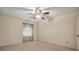 Bright bedroom features neutral walls, a ceiling fan, and a window with curtains at 819 Old Dutch W Rd, Indian Trail, NC 28079