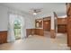 Bright dining area with large window and view into the living room at 819 Old Dutch W Rd, Indian Trail, NC 28079