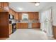 Bright kitchen with wood cabinets, stainless steel appliances, and window at 819 Old Dutch W Rd, Indian Trail, NC 28079