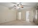 Bright main bedroom features neutral walls and two doors, one leading to a bathroom at 819 Old Dutch W Rd, Indian Trail, NC 28079