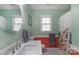 Well-lit bathroom featuring a white vanity, hexagon tile floors, and stylish fixtures for a fresh aesthetic at 8605 Ducksbill Dr, Charlotte, NC 28277