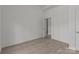Bedroom featuring luxury vinyl plank flooring, baseboard molding, recessed lighting, and neutral walls at 869 Kathryn Se Dr, Concord, NC 28025