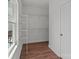 Walk-in closet with wire shelving, wood floor and natural light from the window at 869 Kathryn Se Dr, Concord, NC 28025