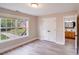 Bedroom featuring wood-look floors and an en-suite bathroom at 1000 Potters Bluff Rd, Monroe, NC 28110